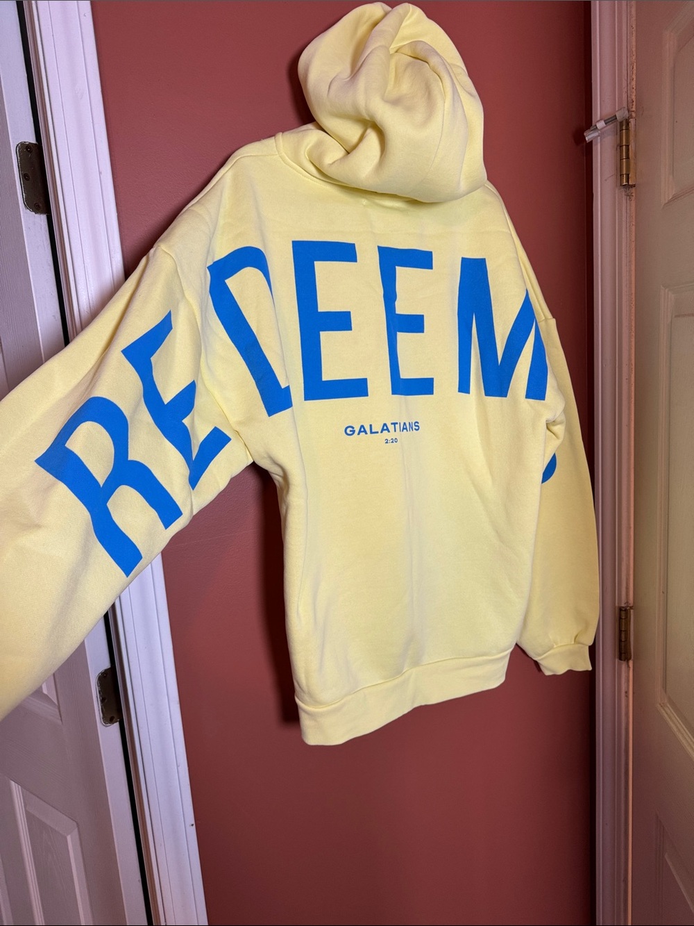 NWOT Gods love overcomes Yellow 'Redeemed' Graphic Hoodie - Unisex sizing